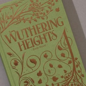 Wuthering Heights by Emily Bronte, a beautiful green hardbound book with ornate copper foil detailing.