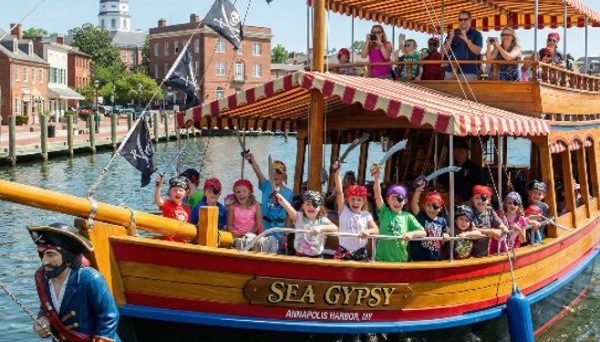 Pirate ship "Sea Gypsy" with children in costume near Annapolis Harbor attractions.