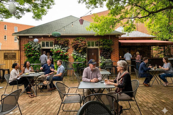 People dining and socializing at an outdoor restaurant patio for private events.