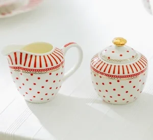Red Josephine fine porcelain sugar and creamer set with stripes and dots.
