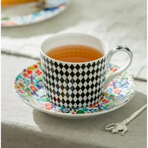 Mad Hatter fine bone china teacup and saucer with a diamond pattern and floral design